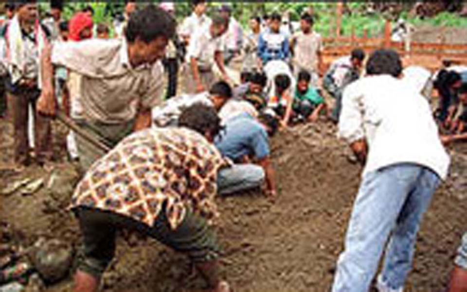 Mass grave in Aceh (Acheh Times)