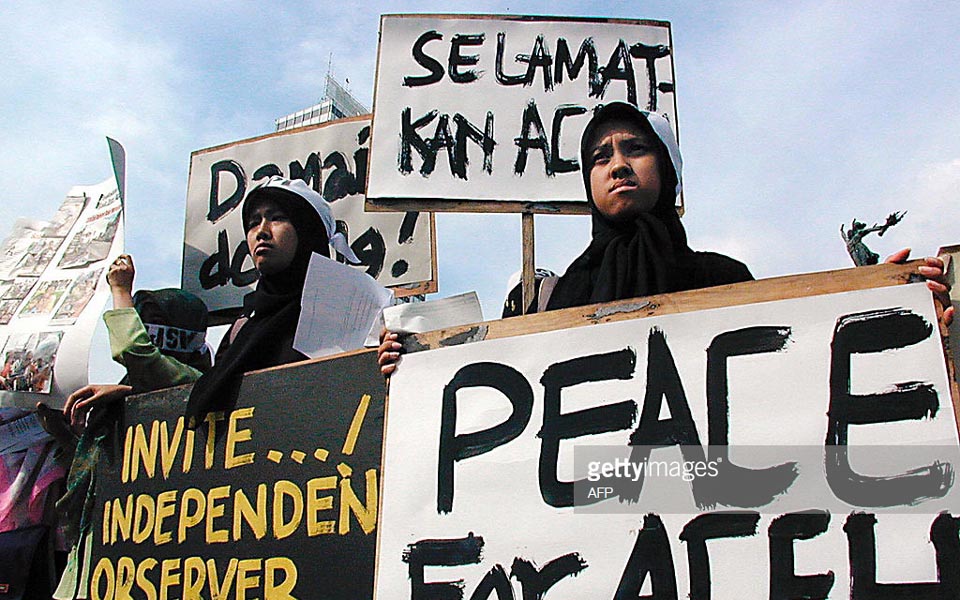 Protesters call for peace in Aceh (Getty Images)