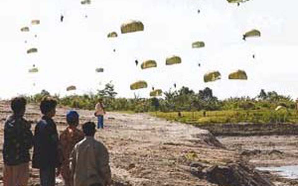 Indonesian troops parachuting into Aceh (Acheh Zone)