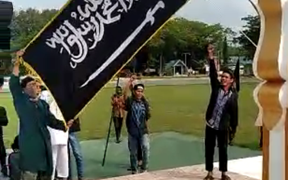 Screenshot from video of HTI flag raising in Poso - October 26, 2018 (Detik)