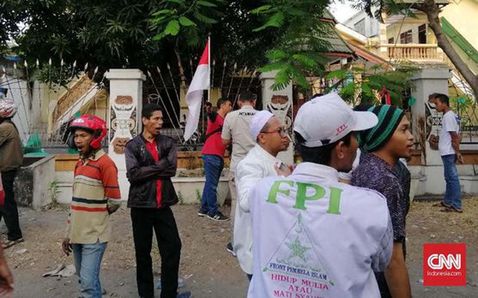 Islamic Defenders Front member at Papuan dormitory in Surabaya – August 17, 2019 (CNN)