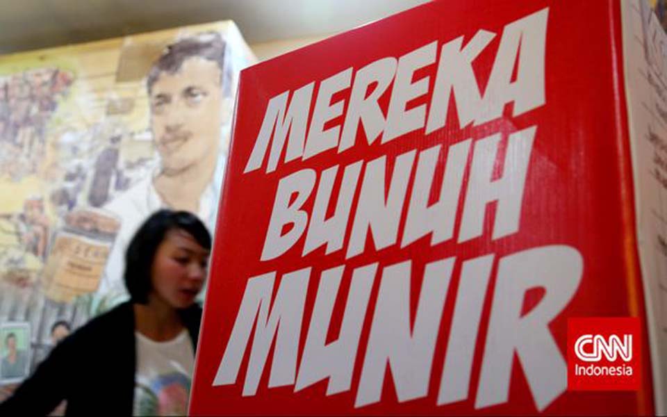 Kontras poster reading ‘They Murdered Munir’ – November 30, 2014 (CNN)