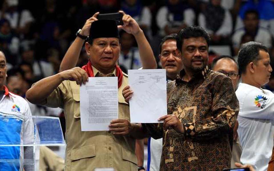 Prabowo Subianto (left) and Said Iqbal – May 1, 2018 (Tribune)