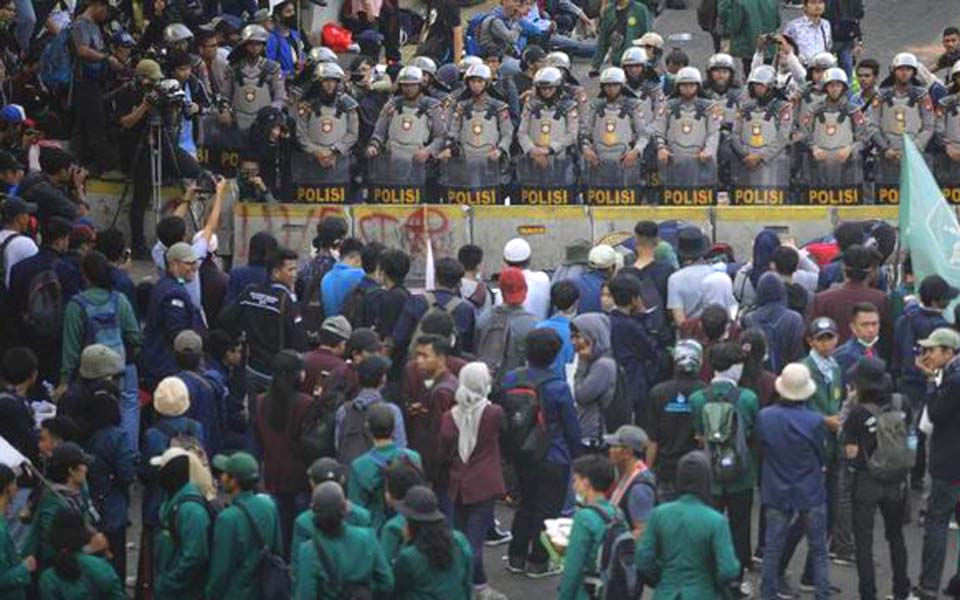 Students and police face off during protest in Jakarta (CNN)
