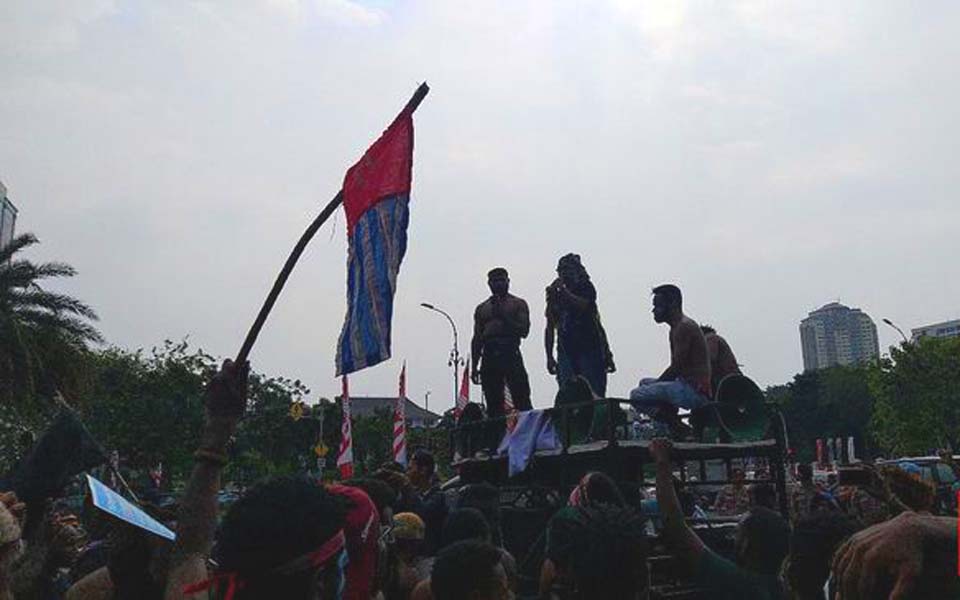 Students fly Morning Star flag at rally in Jakarta – August 22, 2019 (CNN)