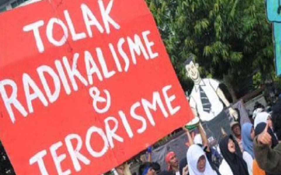 Banner reads 'Reject Radicalism and Terrorism' (KBR)