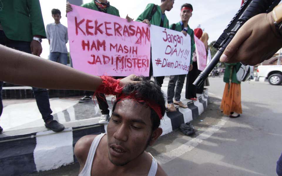 Protest calling for resolution of human rights violations in Aceh (asnlf)