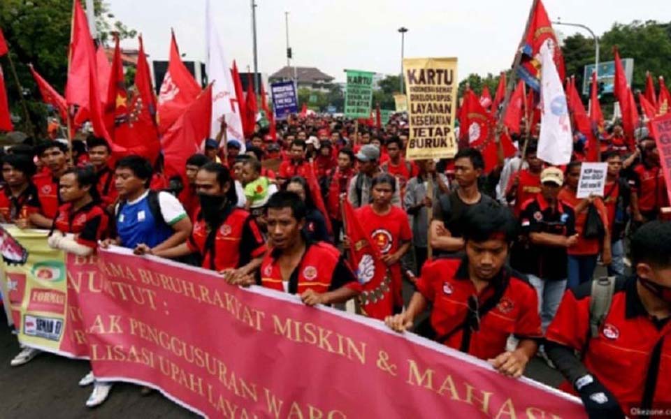 Workers commemorate May Day in East Java city of Malang (Okezone)