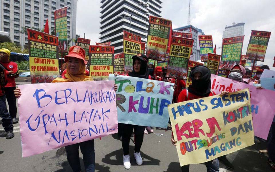 Women workers commemorate International Women's Day in Jakarta (Sindo News)