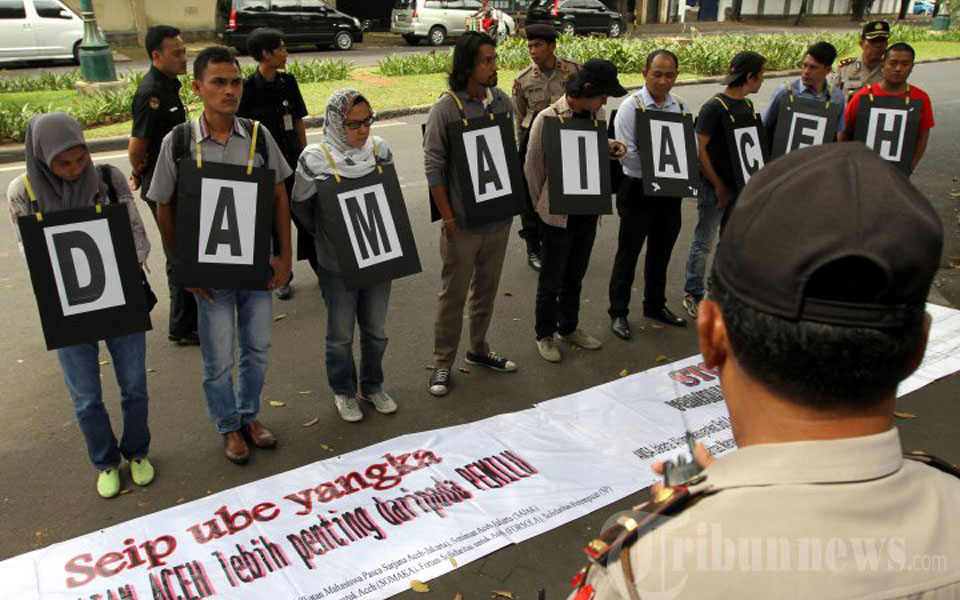 Rights activists protest against election violence in Aceh (Tribune)