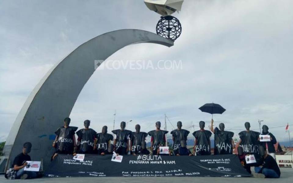 PBHI and human rights activists hold protest action in Padang (Covesia)