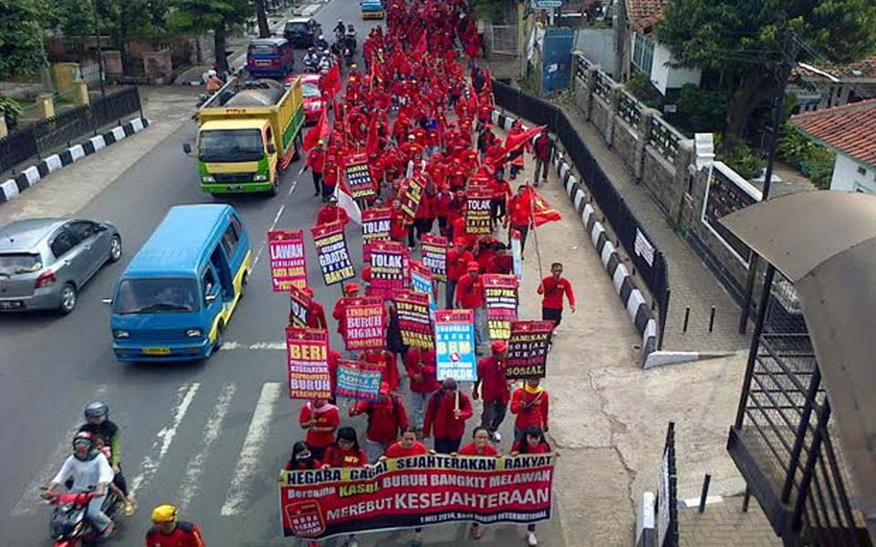 Workers commemorate May Day in Palembang (Sindo News)