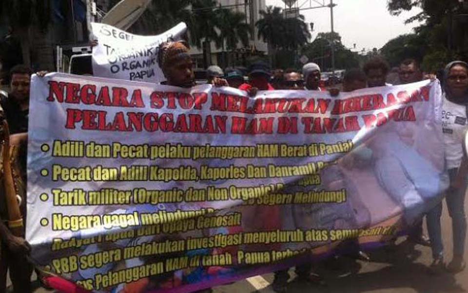 Rally demanding justice for human rights violations in Papua - December 10, 2014 (Liputan6)