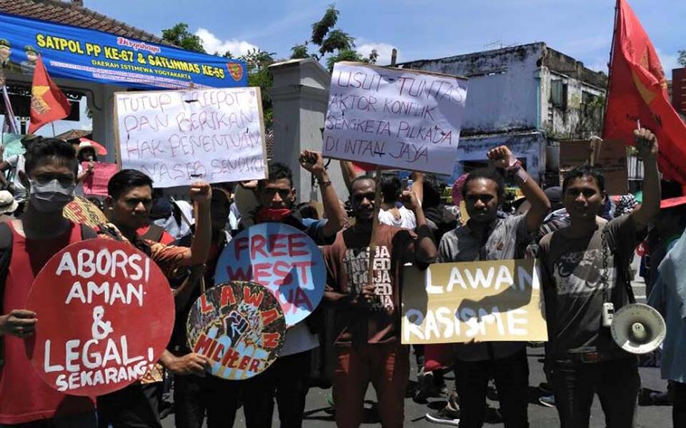 Workers commemorating IWD in Jakarta demand end to sexual harassment and violence against women