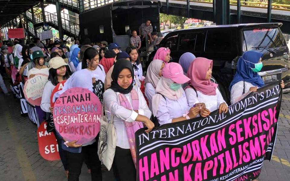 Activists in Makassar mark IWD with calls to end violence against women and children