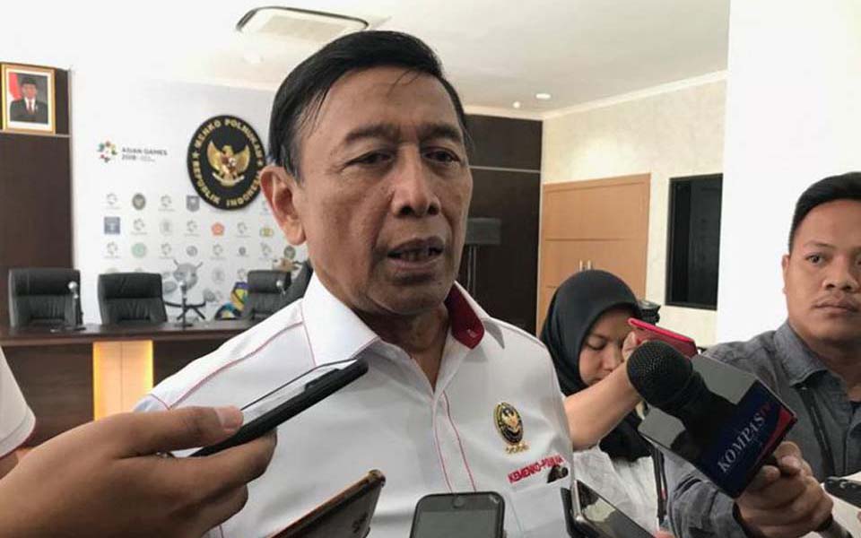Security minister Wiranto speaks to journalists in Jakarta - August 27, 2018 (Kompas)
