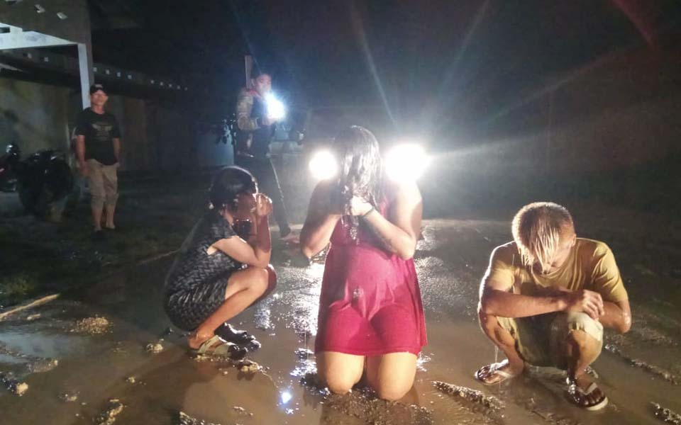 Transgender women being hosed down with fire truck - November 2, 2018 (Twitter)